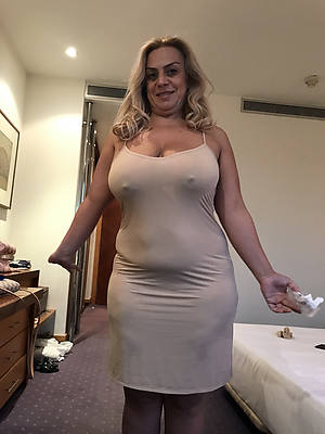 beautiful downcast dressed mature